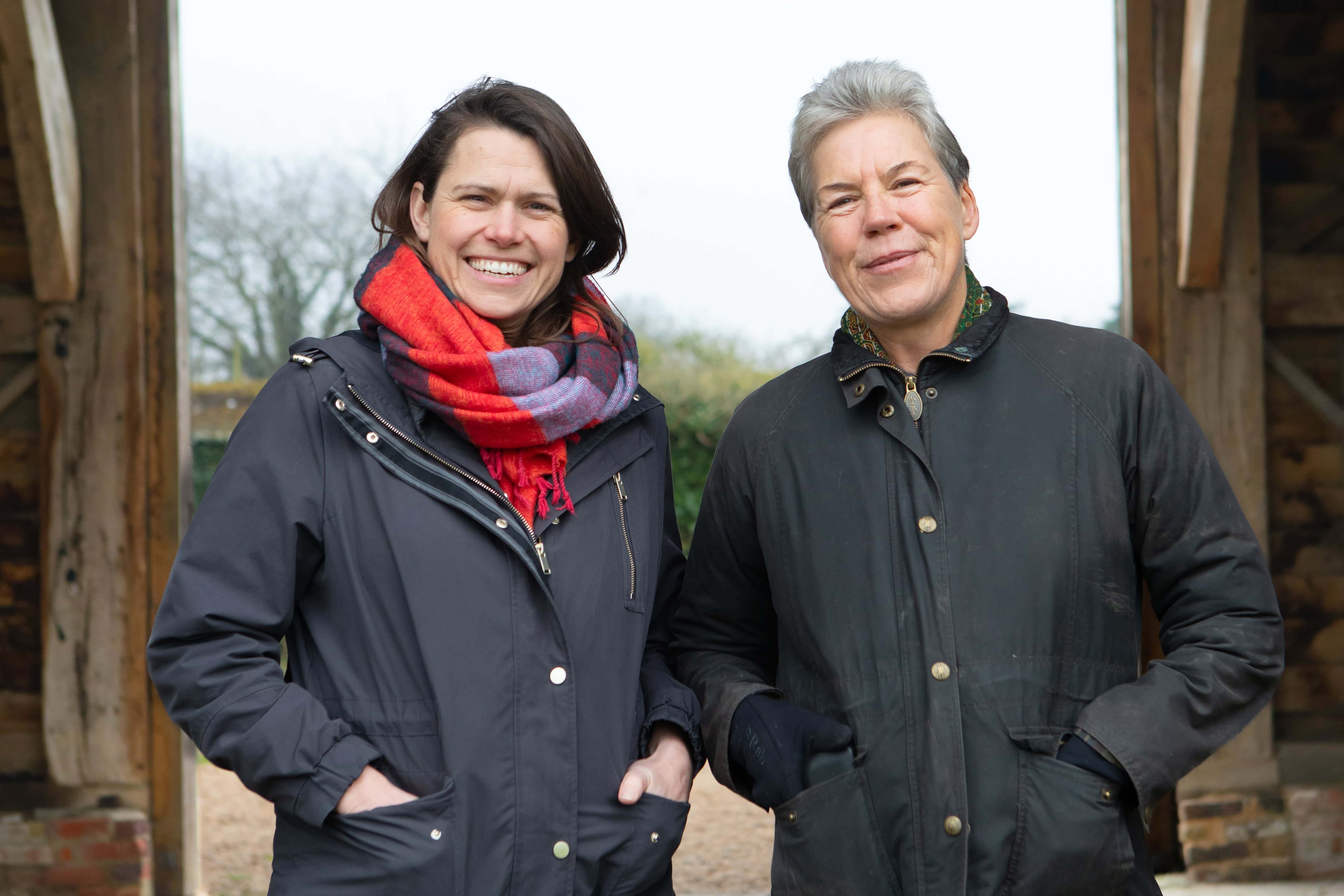 Photo of Hannah Gibson, CEO of Ocado Retail and Helen Browning, CEO of Soil Association on a farm
