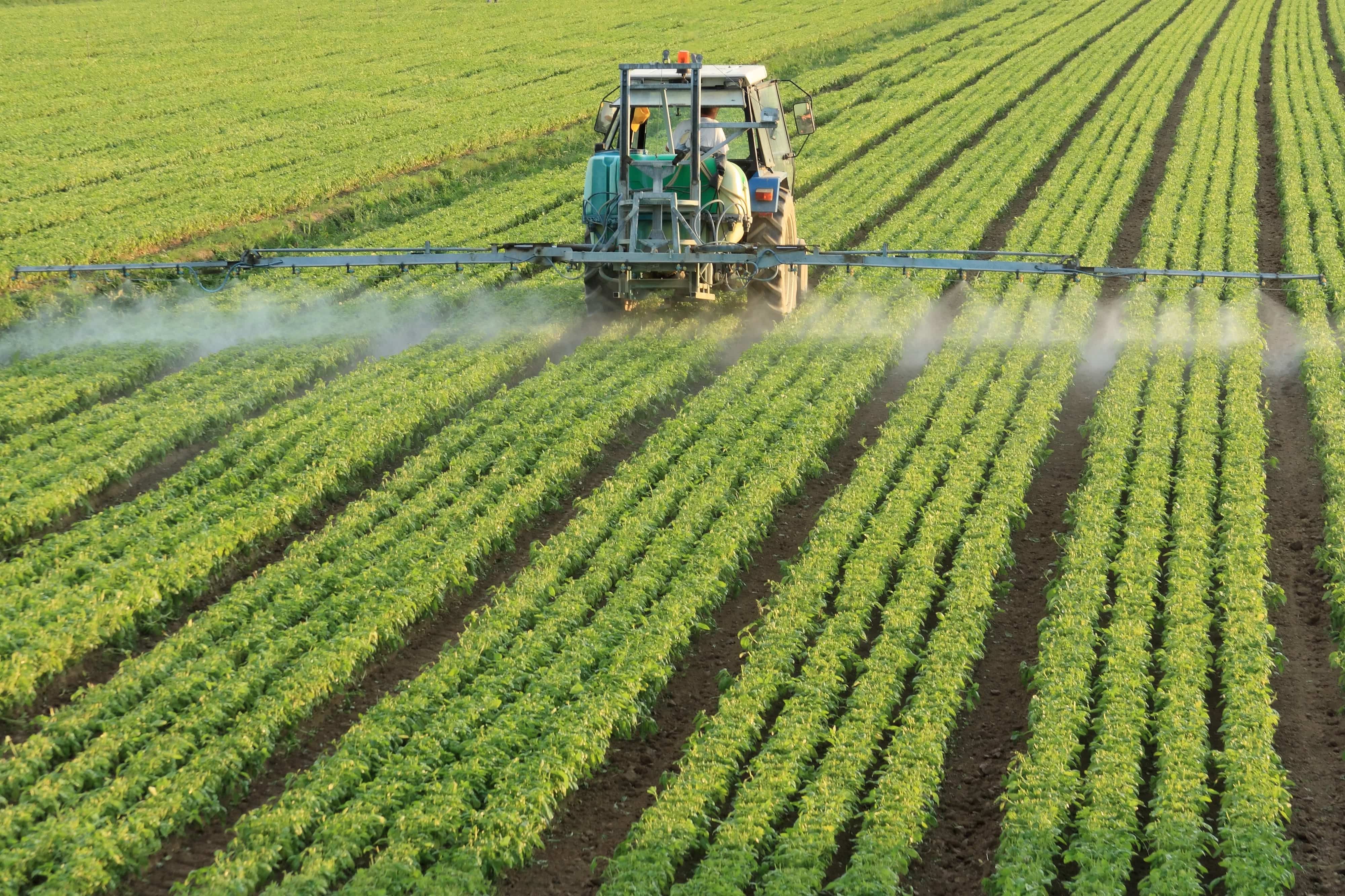 pesticide tractor spray fields.jpg